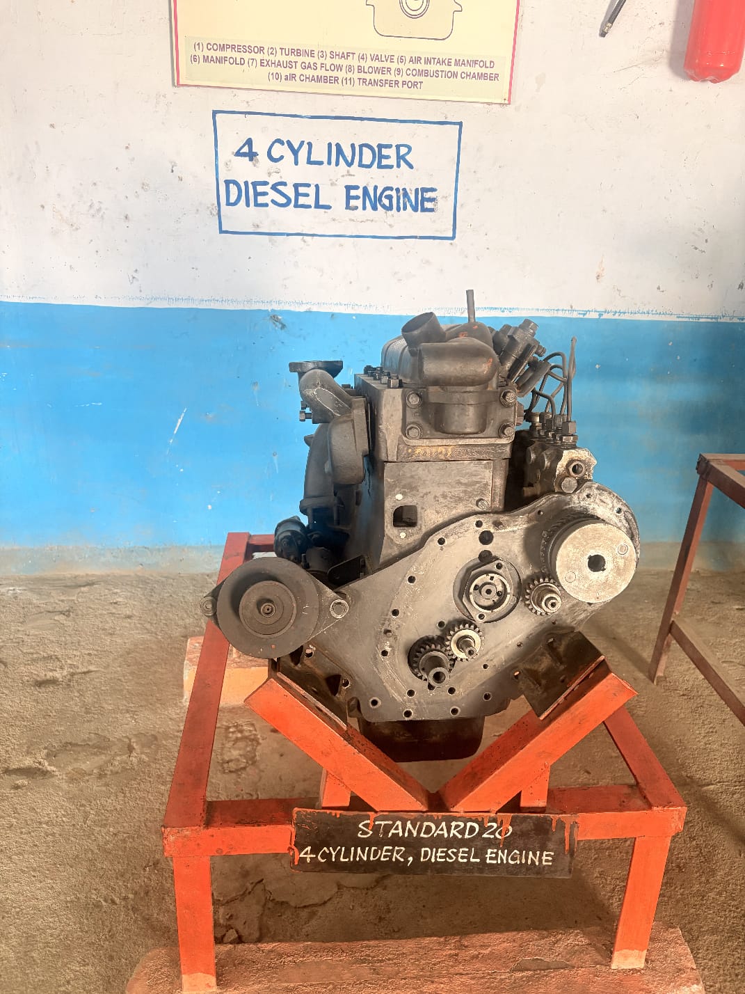4 cylinder diesel engine model in workshop